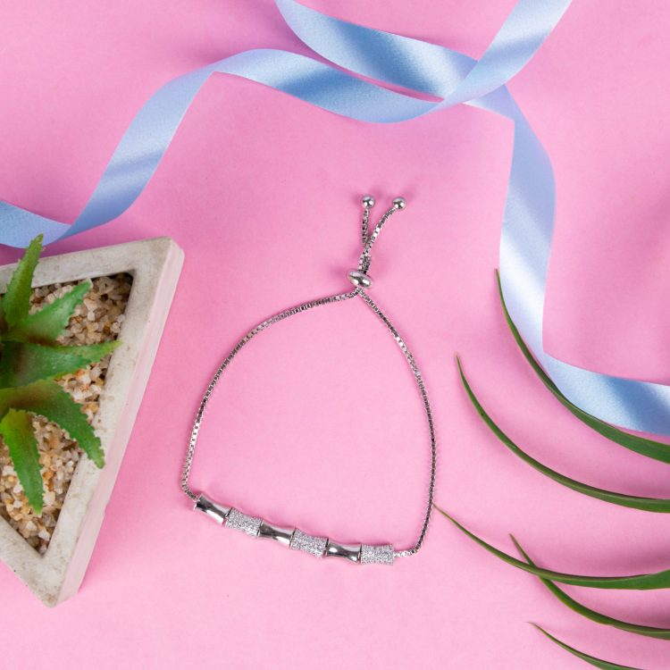 Whimsical Ribbon Adjustable Silver Bracelet