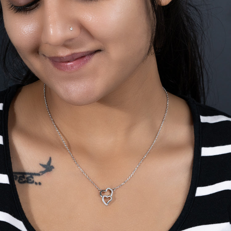 Silver intertwined hearts necklace