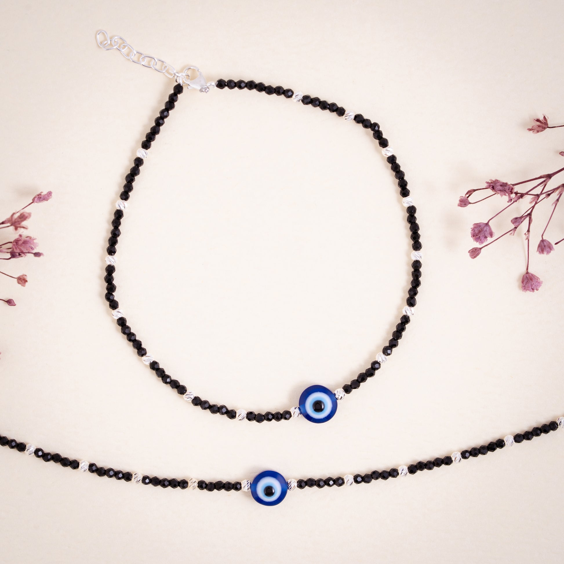 925 hallmarked sterling silver evil eye anklet with black beads and blue protective charm by Glyters
