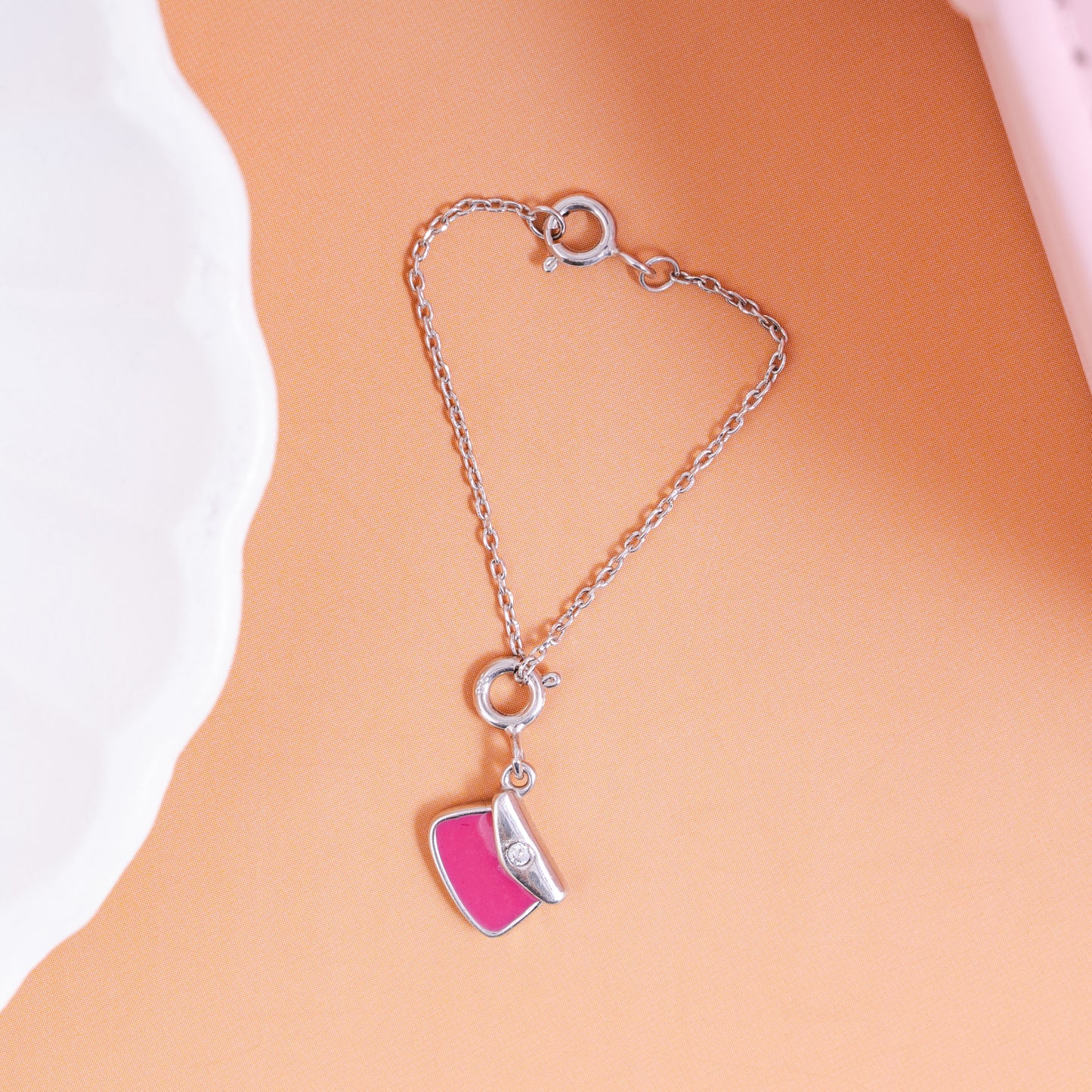 Clutch Sync Silver Charm