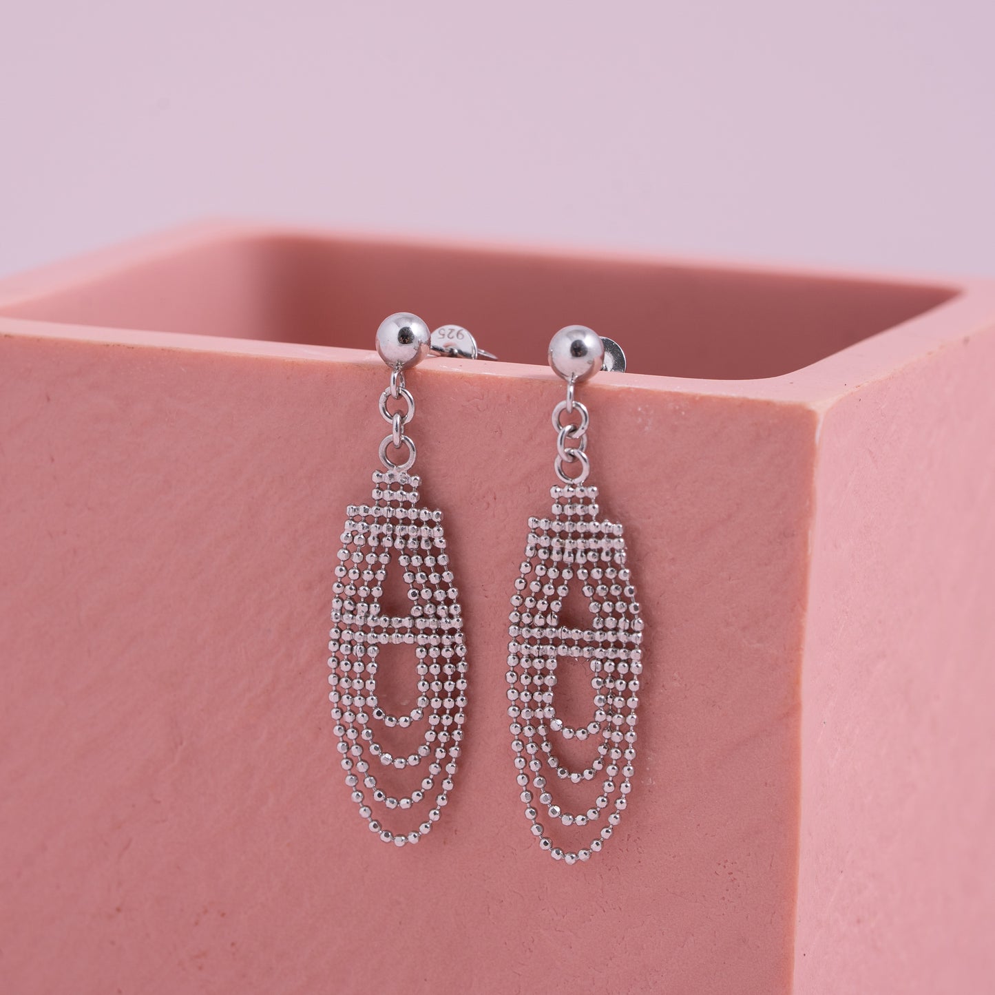 Silver Regal Drape Earrings