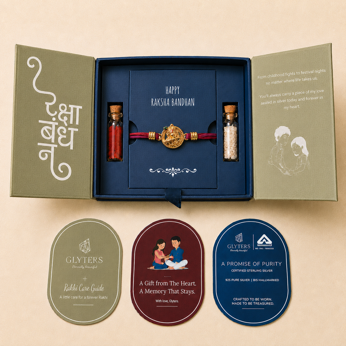 A boxed Rakhi bundle shown open on a beige background, with a red and gold thread bracelet centered in a navy insert. The open box has olive-green inner flaps with Devanagari text and a poem.