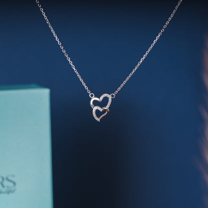 Silver intertwined hearts necklace