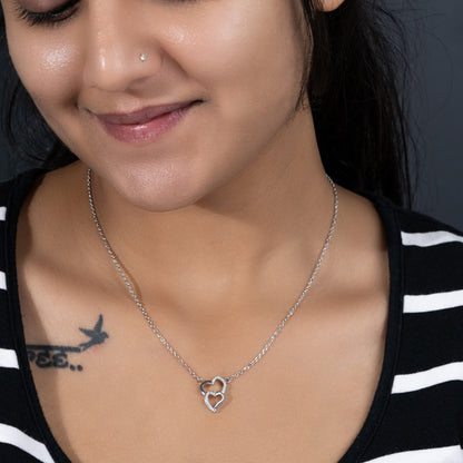 Silver intertwined hearts necklace