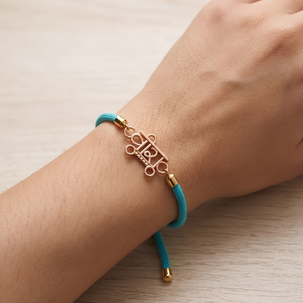 [finish: rose-gold] Veera Charm Rose Gold Silver Rakhi 